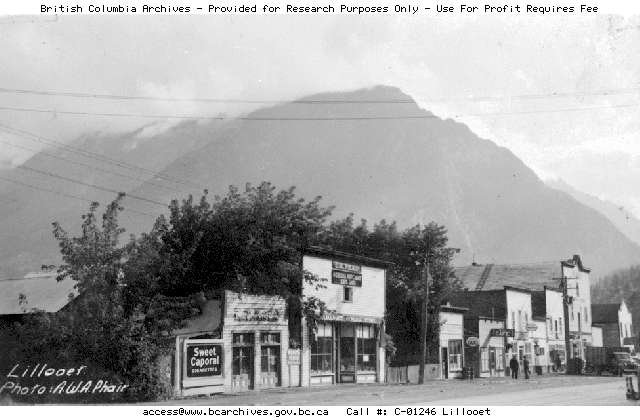 BC Archives # C-01246, Stores on Main Street, Lillooet, w. view of Nkoomptch, Lillooet before the fire