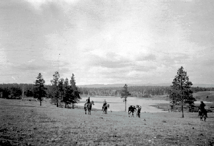 BC Archives # I-58357, Cinching up horses at Cayuse Creek