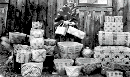 BC Archives # C-01165, Mrs. Frank Brokaw w. native basketry, 1913, Pemberton